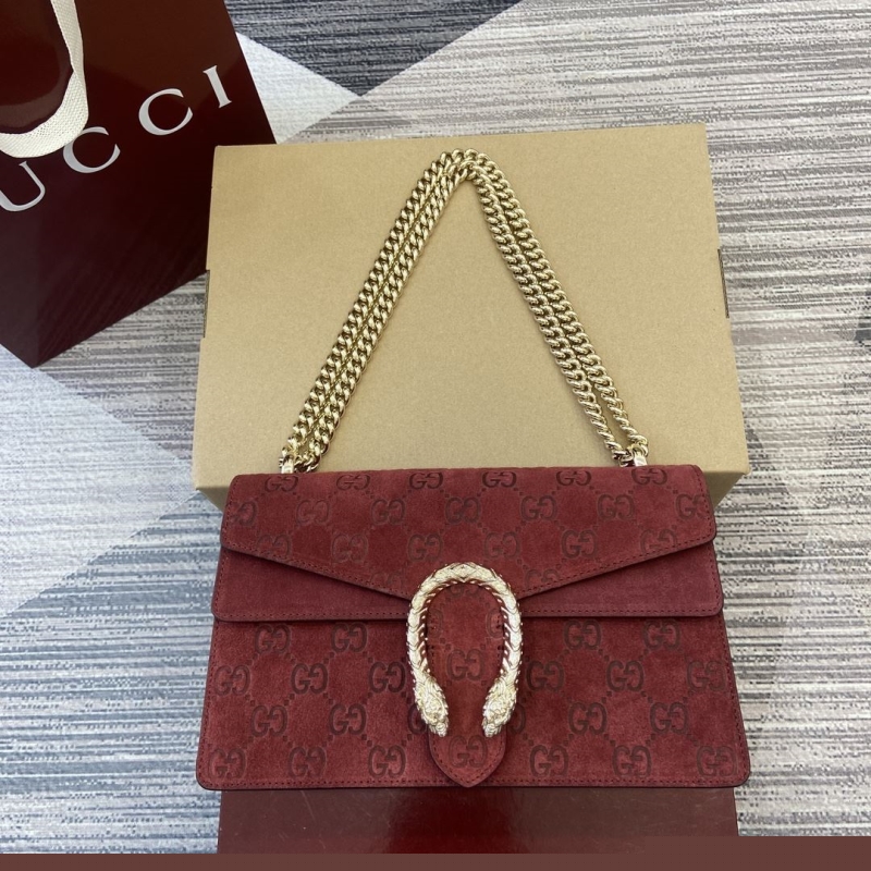 G*u*i top handle bags